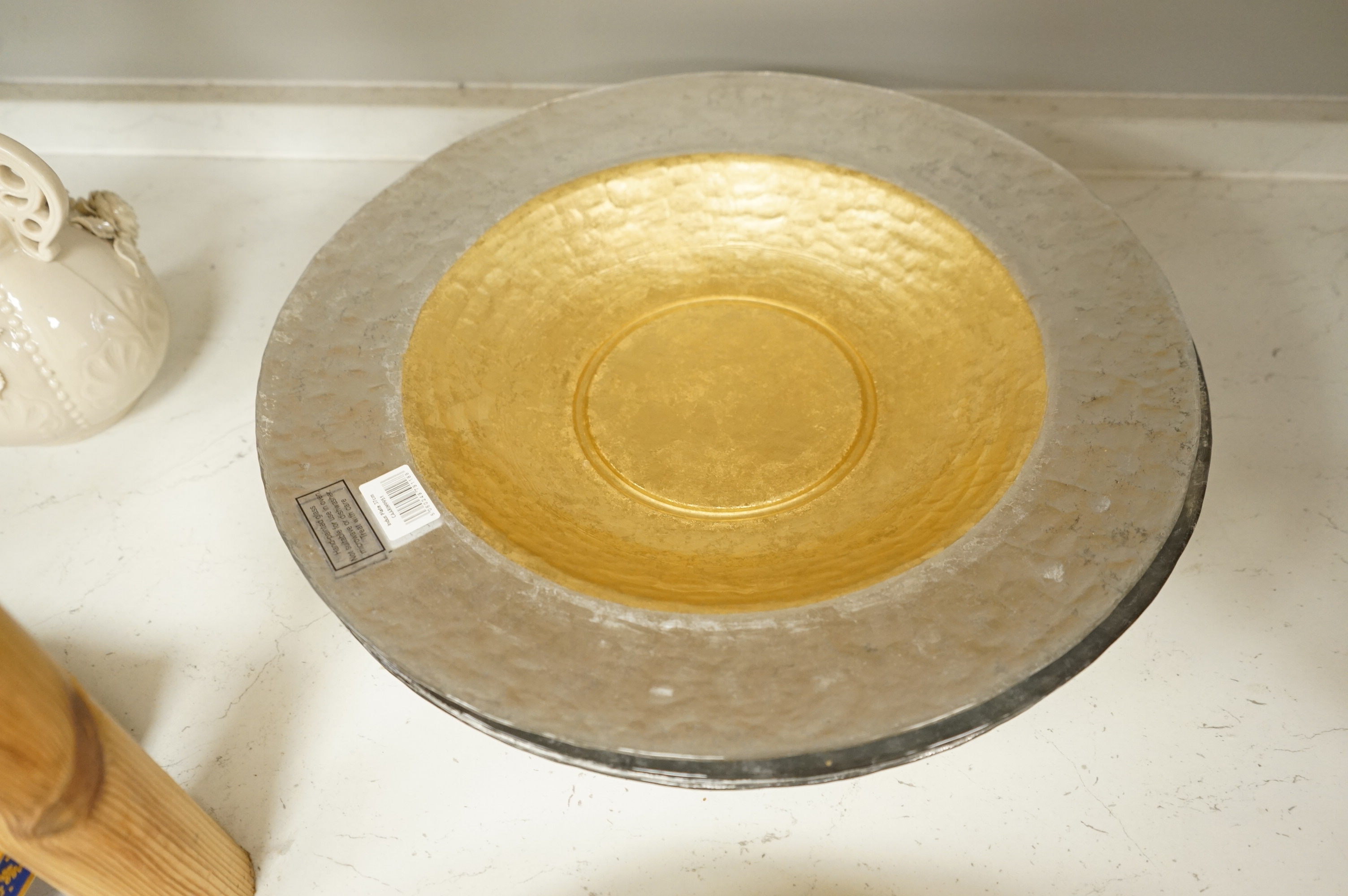 Deborah Timperley, a Studio art glass dish, 34cm, together with ten Carnelian studio glass dishes, largest 37cm